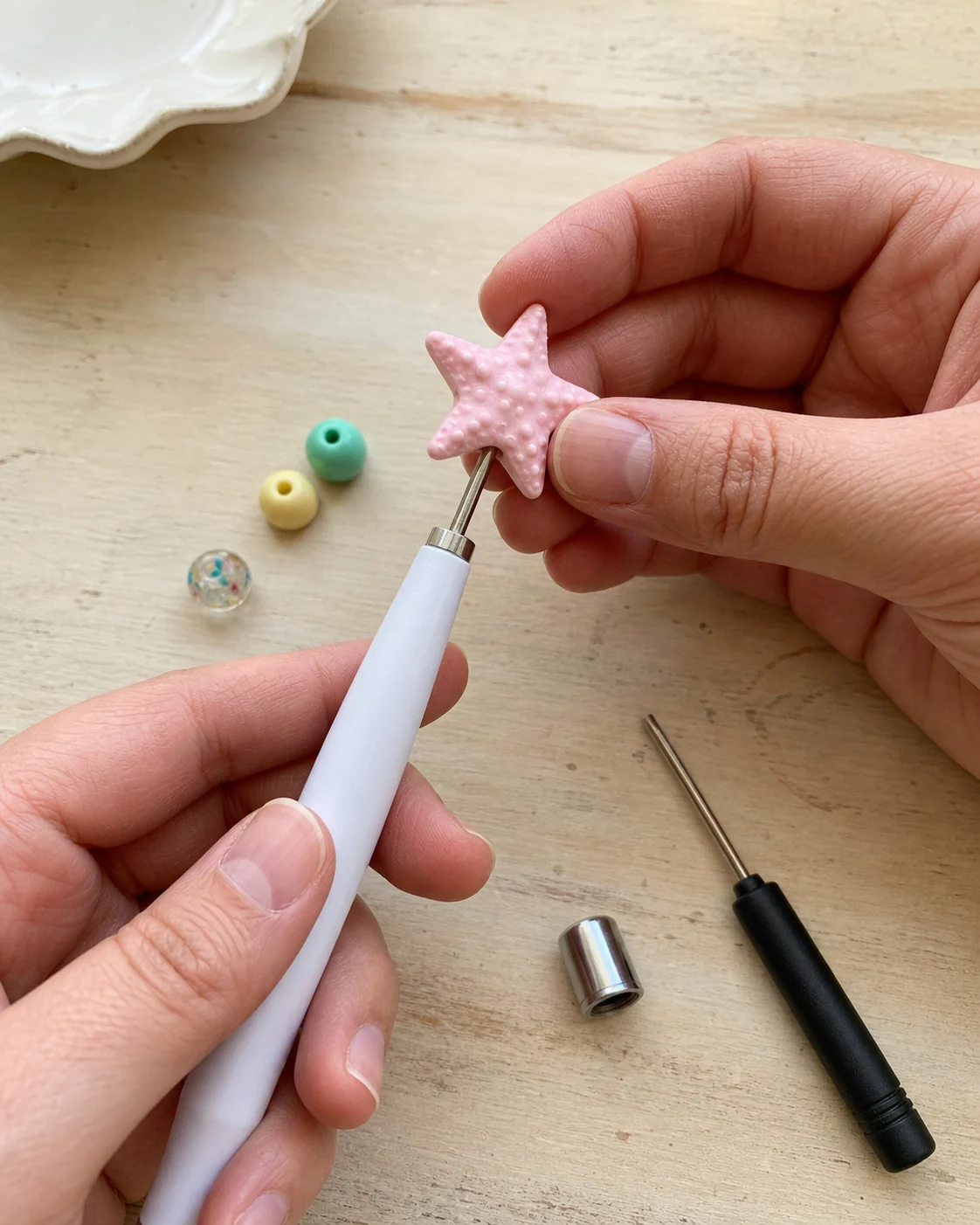 Beadable pen assembly concept with focal beads, spacers and pen shafts on a craft table