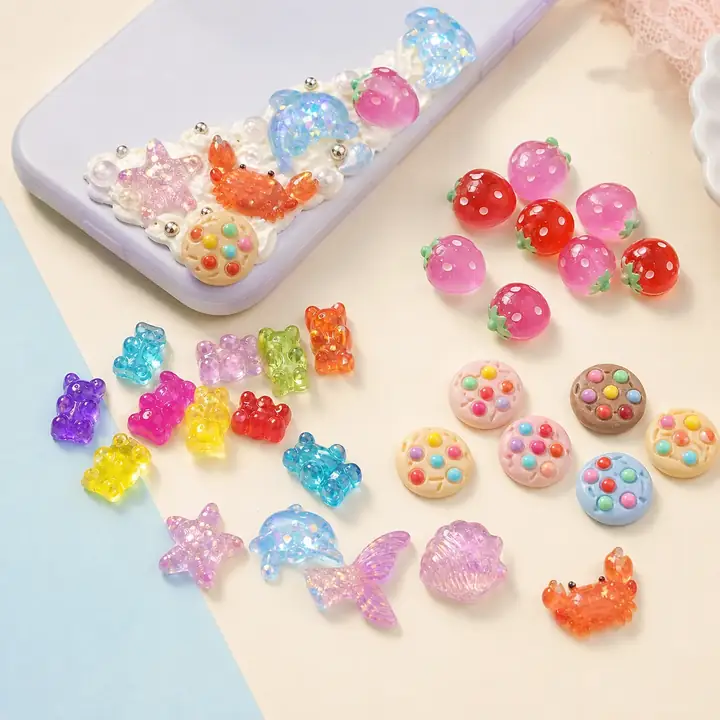 Strawberry, ocean, gummy bear, and cookie resin flatback charms for decoden
