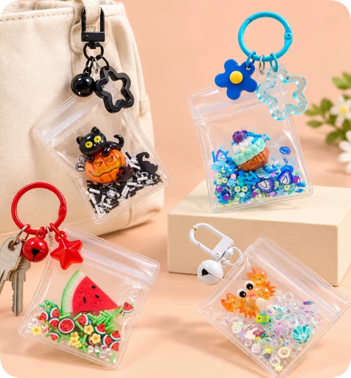 CDK24643-2/CDK080-2/CDK003049-1/CDK003219-1 Clear Pouch Shaker Keychain Assortment
